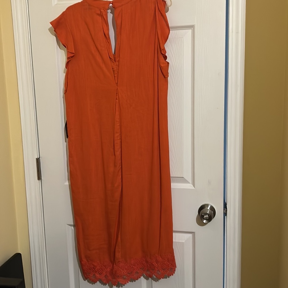 Pretty new burnt orange dress. Never worn.